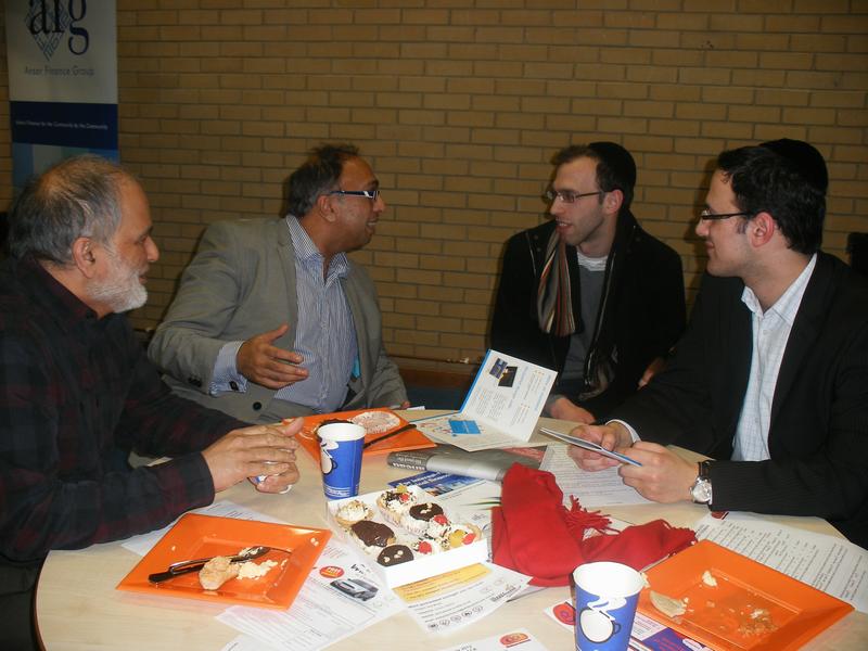 Photograph of a table discussion at the business networking event.